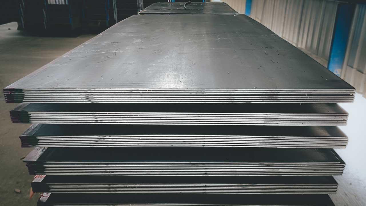 Stacks of steel plate in a warehouse